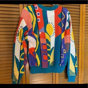 Vintage knit sweater with abstract sun detail